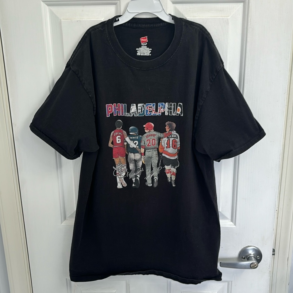 Boys/men’s Philadelphia tshirt. The black color is slightly worn.